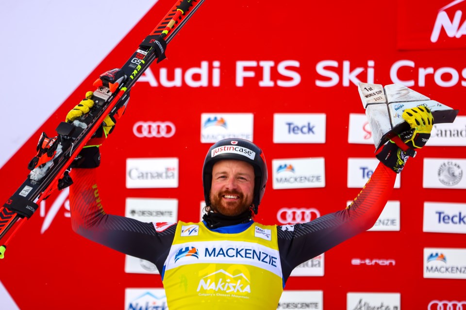 Canmore's Kris Mahler celebrates victory on the podium during the men's World Cup ski cross event at Nakiska in Kananaskis Country in January 2022. RMO FILE PHOTO