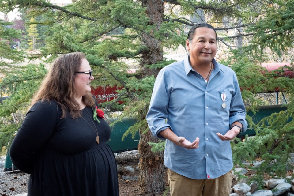 Morley Community School principal Jeff Horvath was awarded the Queen Elizabeth II Platinum Jubilee Medal by Edmonton-Glenora NDP MLA Sarah Hoffman, left, in his backyard in Canmore Oct. 19. 

PHOTO COURTESY OF STEPHEN LEGAULT