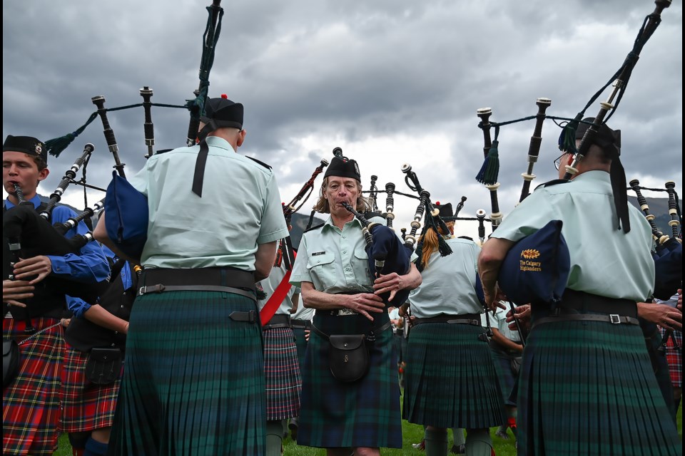 All the pipe and drum bands parade and perform in unison for the closing ceremonies at the Canmore Highland Games on Sunday (Sept. 3). MATTHEW THOMPSON RMO PHOTO