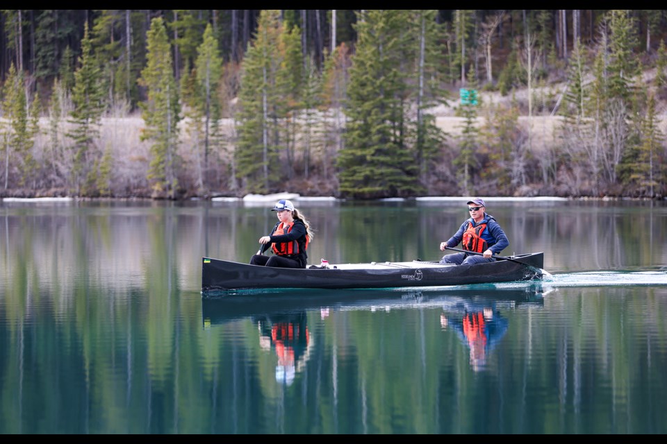 Natasia and her father, Steve Varieur, hit Rundle Forebay Reservoir on the morning of Saturday (April 27) as they prepare for the Yukon River Quest. The Yukon River Quest is an annual marathon paddling race. JUNGMIN HAM RMO PHOTO