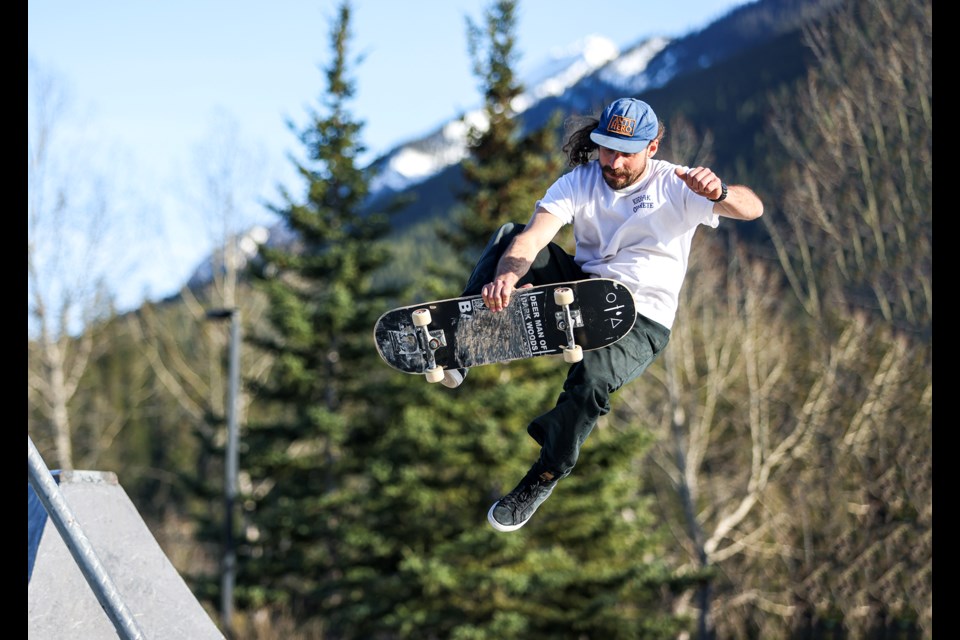 Cameron Brown grabs the middle of the board while catching air at Banff Skateboard Park on Thursday (May 9). JUNGMIN HAM RMO PHOTO