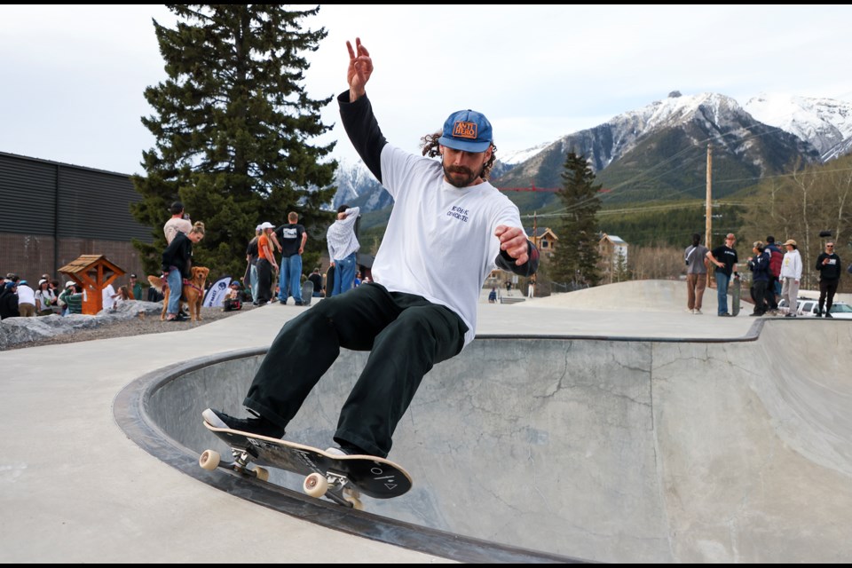 Cameron Brown does a 50-50 grind on the metal coping of the bowl at Skate Night at Canmore Skateboard Park on Friday (May 10). JUNGMIN HAM RMO PHOTO