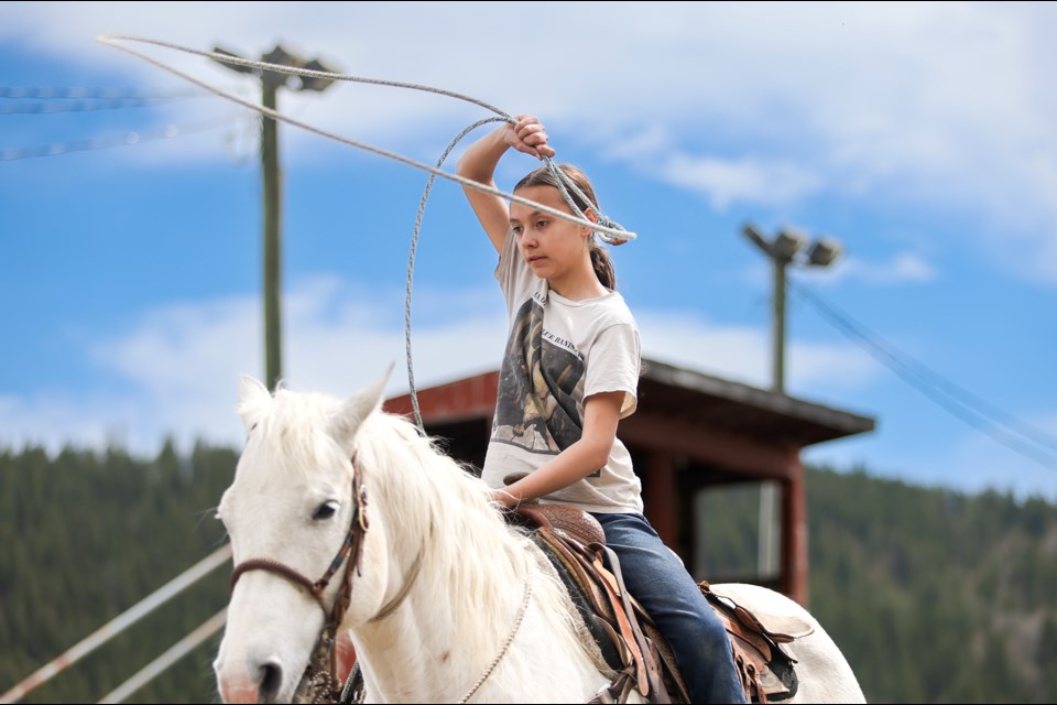 Autumn Wesley practises the balance rope at the roping clinic at Chiniki Rodeo Grounds in Mînî Thnî on Saturday (May 11). JUNGMIN HAM RMO PHOTO