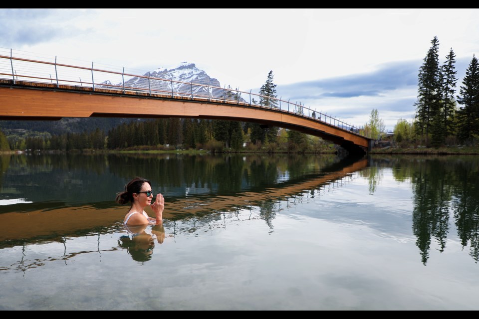 Natasha Blumenthal bathes in the frigid waters of the Bow River in Banff on Saturday (June 1). She has done so every morning since April of last year. JUNGMIN HAM RMO PHOTO 