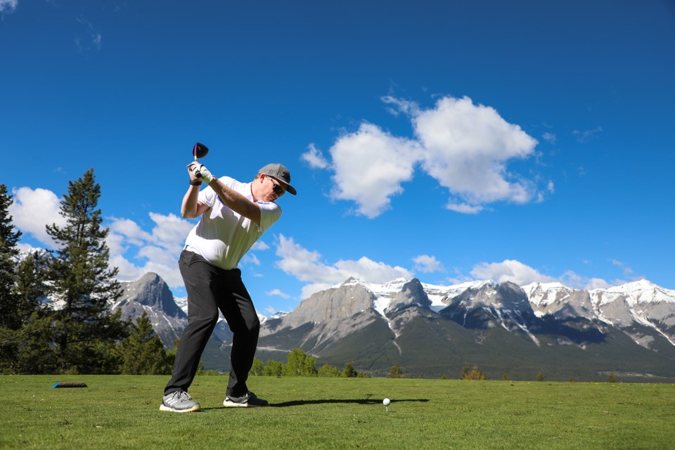 Dan Basecamp tees off on the 18th hole at the 20th Canmore Hospital Foundation (CHF) charity golf tournament at Silvertip Golf Course in Canmore on Friday (June 7). JUNGMIN HAM RMO PHOTO