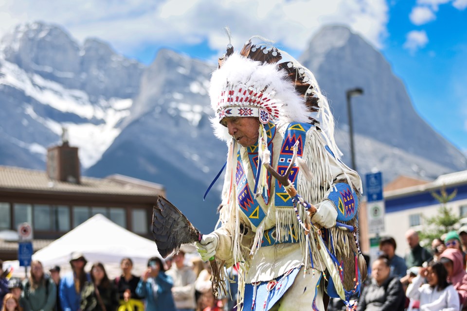 Îyârhe (Stoney) Nakoda First Nation elder Gilbert Francis dances a  traditional dance during a celebration of National Indigenous History Month at the Town of Canmore Civic Centre plaza on Saturday (June 15).  JUNGMIN HAM RMO PHOTO 