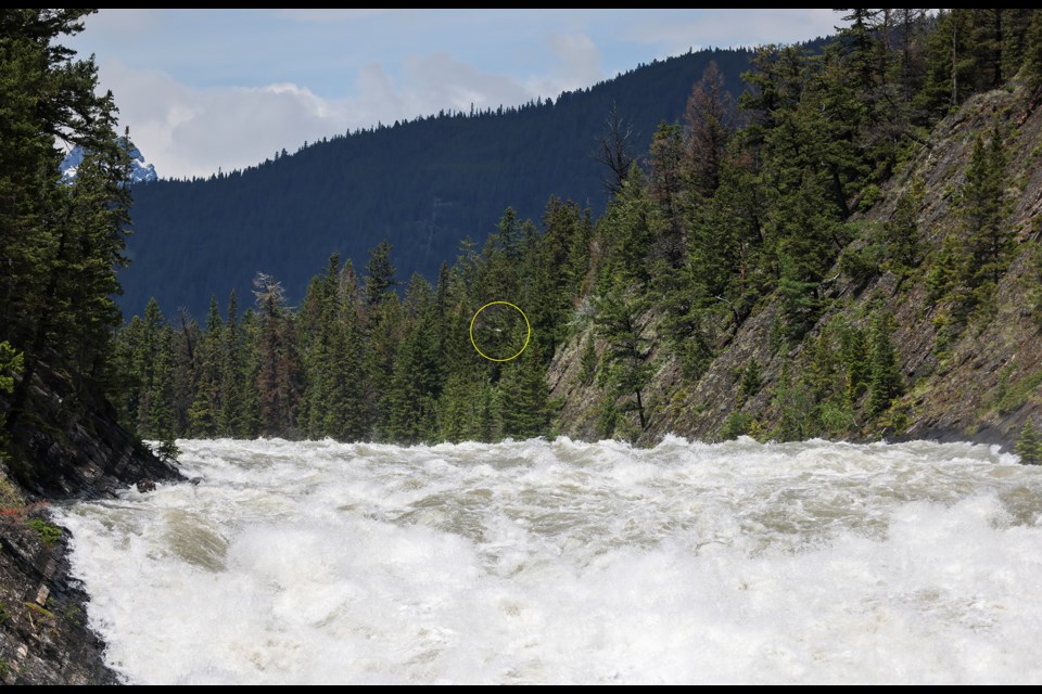 A drone flies around Bow Falls in Banff in June 2024. Using recreational drones in Banff National Park is prohibited. JUNGMIN HAM RMO PHOTO 