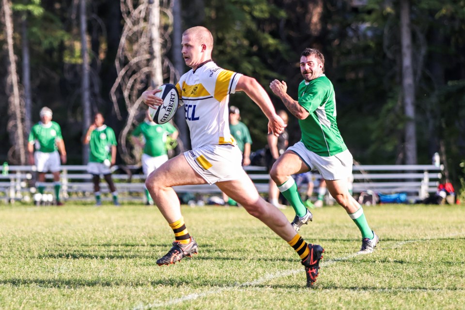 Banff Bears Will Crawford carries the ball up the field during the season home game on Wednesday (July 17) at Banff Recreation Grounds. Banff won 32-21. JUNGMIN HAM RMO PHOTO