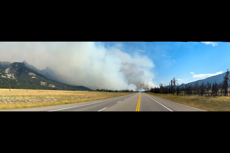 Wildfire smoke billows road side in Jasper National Park

PARKS CANADA PHOTO