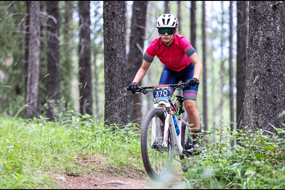 Mountain Crushers’ Sophie Erfle bikes through the course during the 24-hour mountain bike race Canadian Rockies 24 at the Canmore Nordic Centre on Saturday (July 27). JUNGMIN HAM RMO PHOTO 