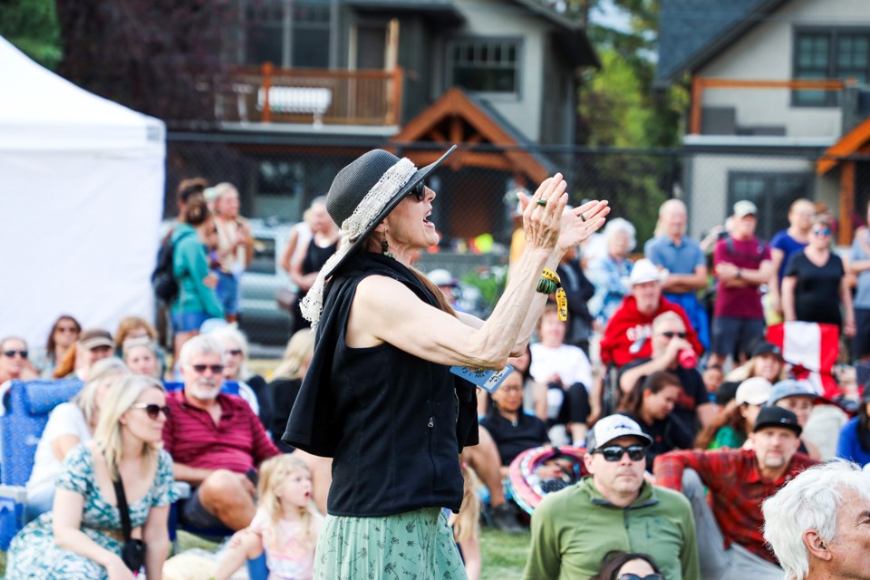 Judy Lorenz claps as Canmore band The Ducks perform at the Festival Friday community concert in Centennial Park on Friday (Aug. 2). JUNGMIN HAM RMO PHOTO