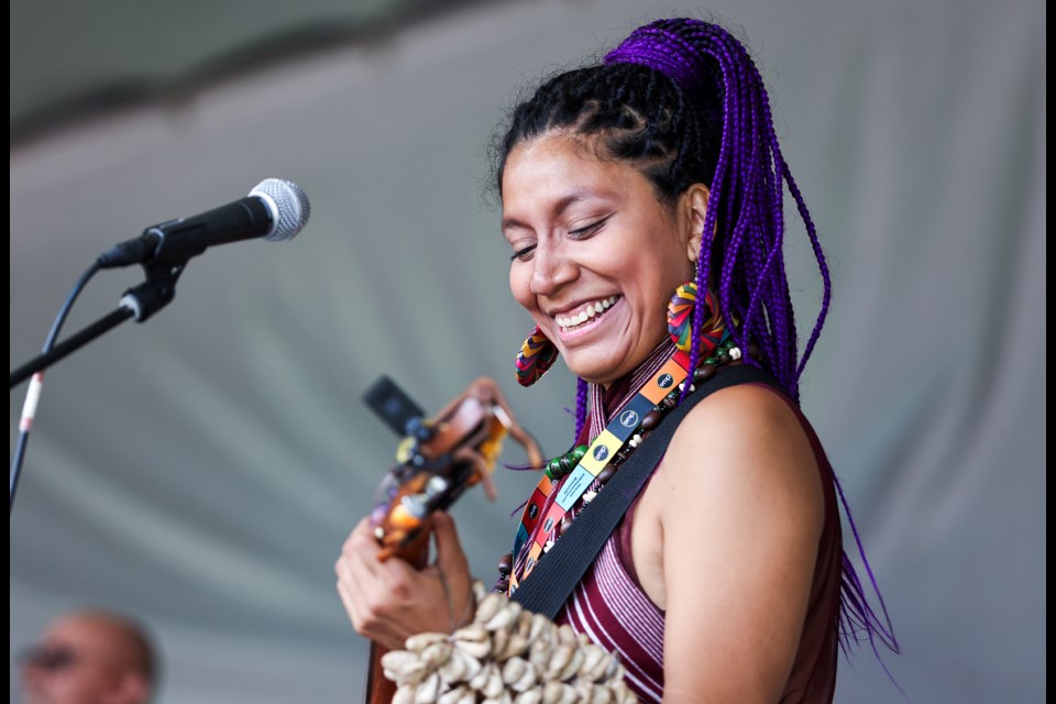 Lupita BuenRostro plays a jarana on the Banff Lodging Co. Stage for the Canmore Folk Festival in Centennial Park on Saturday (Aug. 3). JUNGMIN HAM RMO PHOTO 