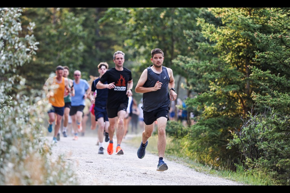 Runners race out of the starting area for the five-kilometre run at the Millennium Parkrun in Canmore on Saturday (Aug. 3). Millennium Parkrun, a free, fun, and friendly weekly 5km community event that takes place Saturdays at 9 a.m. JUNGMIN HAM RMO PHOTO