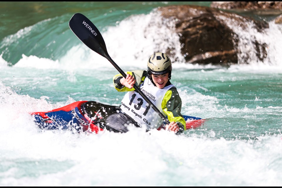 Jordy Munro rides the final stretch of rapids toward the finish line on the Kananaskis River during the the kayak-cross event at KanFest 2024 in Kananaskis on Saturday (Aug. 10). JUNGMIN HAM RMO PHOTO