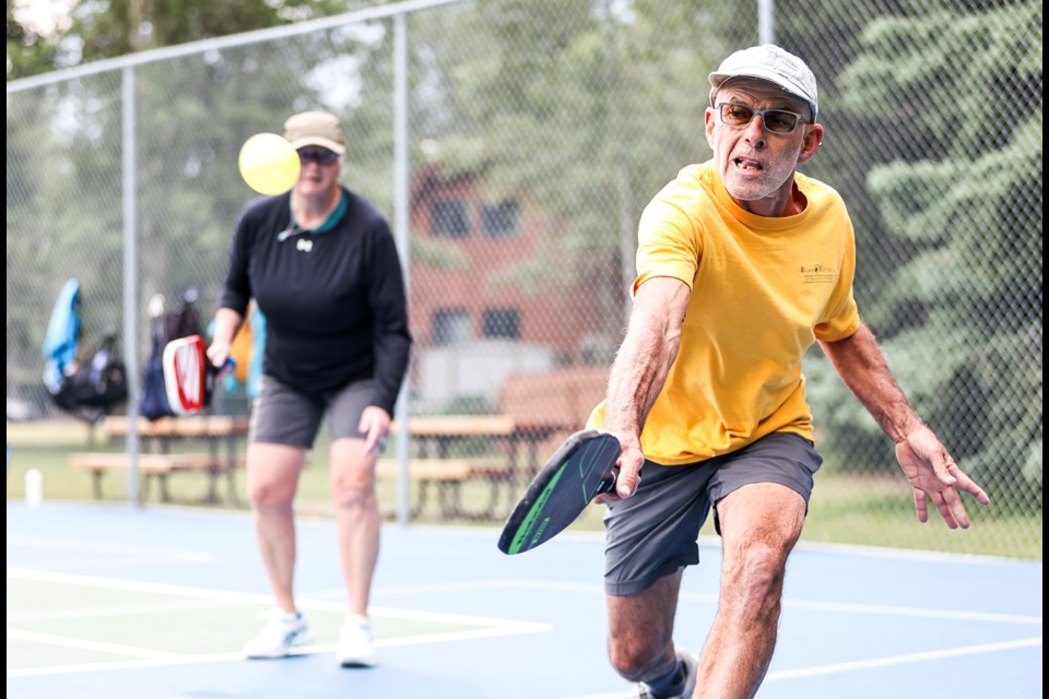 Romeo Bruni loads up a backhand drive during the pickleball ladder ranking system event at Veterans Park courts in Canmore on Wednesday (Aug. 14). JUNGMIN HAM RMO PHOTO 