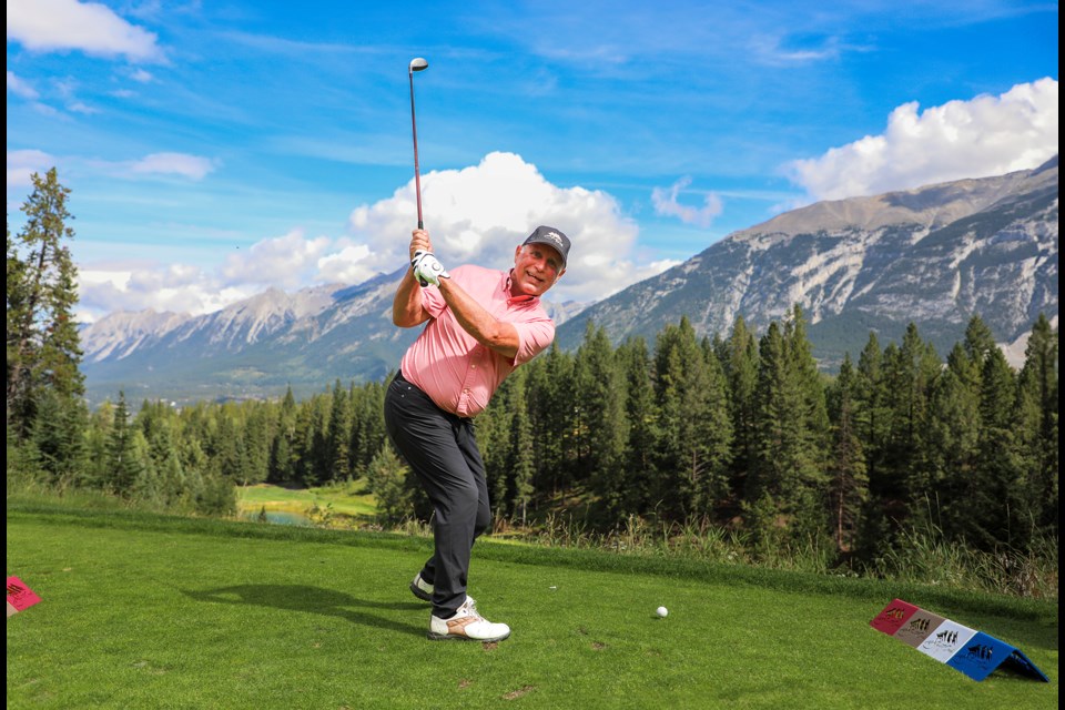 Rolly Godbout poses while he prepares to swing at the sixth annual fundraiser Golf for Hospice event hosted by the Palliative Care Society of the Bow Valley (PCSBV) at Stewart Creek Golf & Country Club in Canmore on Thursday (Aug. 22). JUNGMIN HAM RMO PHOTO 