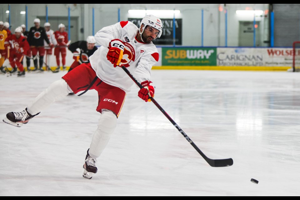 Calgary Flames centre Nazem Kadri blasts a shot on net during the practice at the Canmore Recreation Centre on Thursday (Oct. 17). JUNGMIN HAM RMO PHOTO