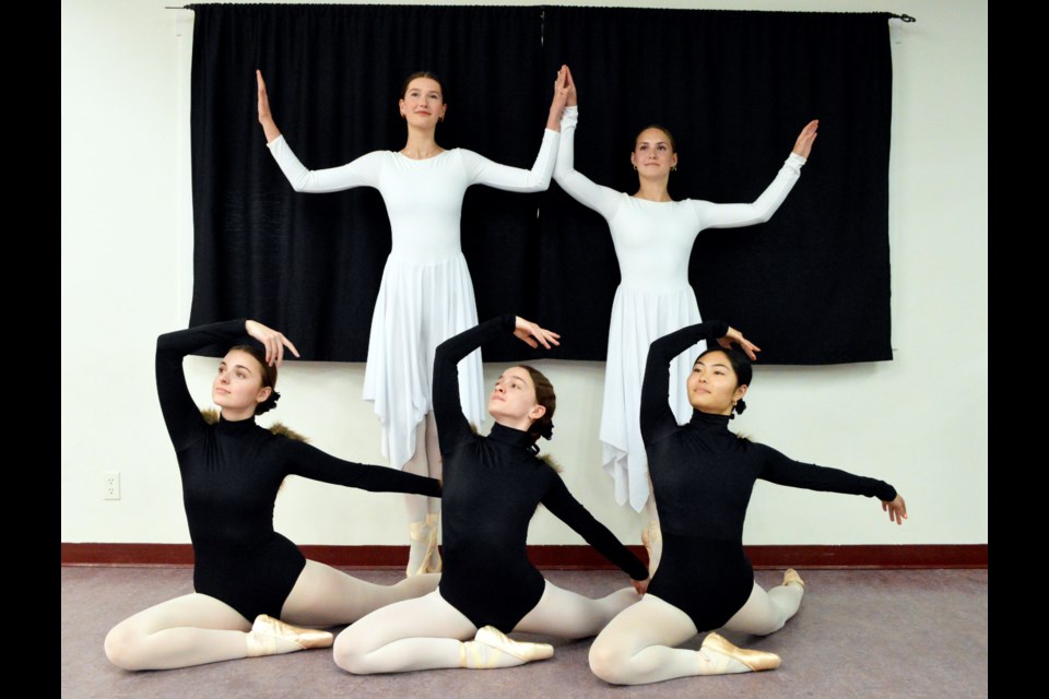 Ready for the big weekend, five of Canmore Dance Corps performers (back row) Elise Baars, left, Harper Long, (front row) Sloane Donnelly, left, Maddie Cross, and Tsukino Mori, get into character ahead of the competitive showcase Thursday and Friday (May 18-19) and year-end show, Earth Dances, Saturday and Sunday (May 20-21) at artsPlace in Canmore. JORDAN SMALL RMO PHOTO