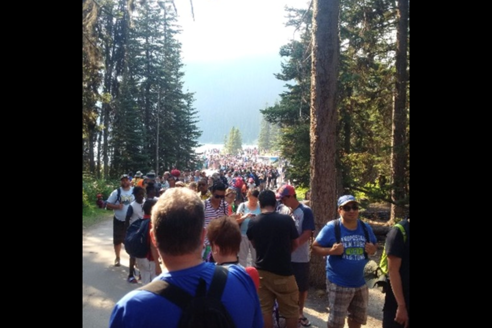 The line-up to board a Parks Canada shuttle at Upper Lake Louise, in summer 2017. PARKS CANADA HANDOUT