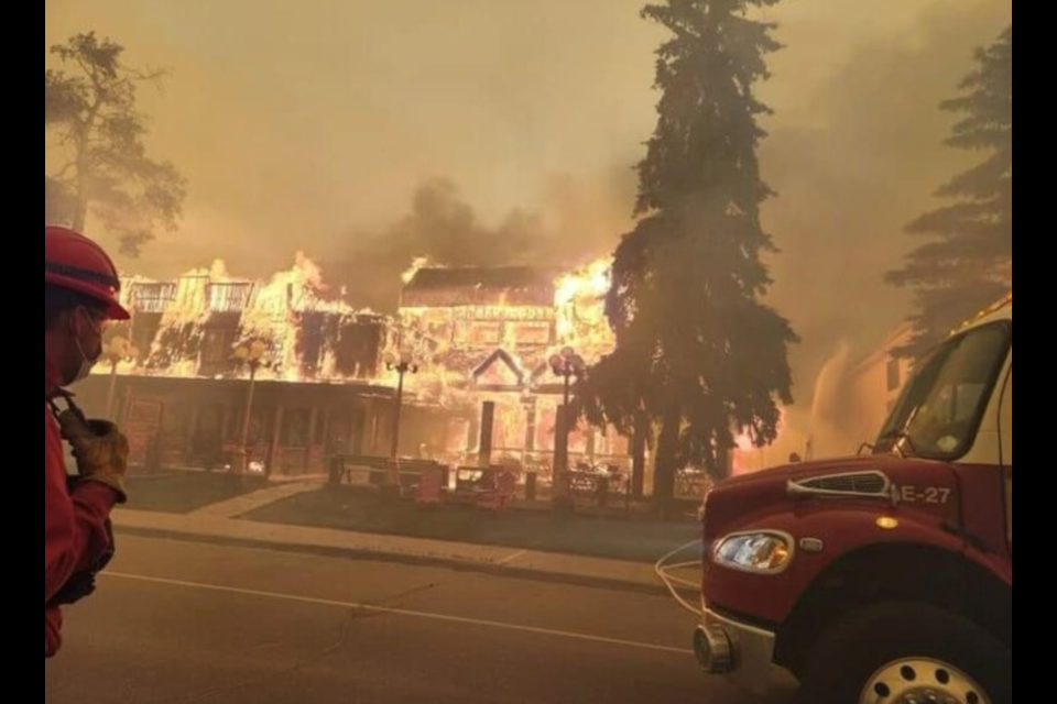 A wildfire from the south has reached the Jasper townsite. Maligne Lodge, at the southern entrance to town, is ablaze. FACEBOOK PHOTO