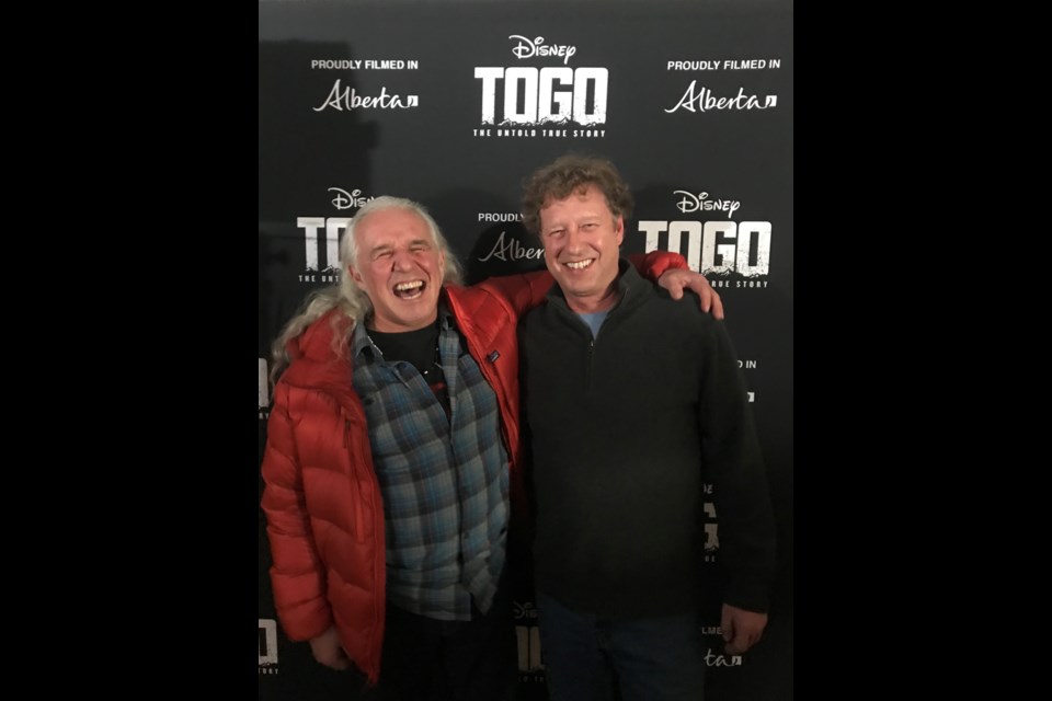 Yamnuska Mountain Adventures ACMG mountain guides Barry Blanchard, left and Dave Stark, celebrate at the Togo premier in Cochrane. SUBMITTED PHOTO