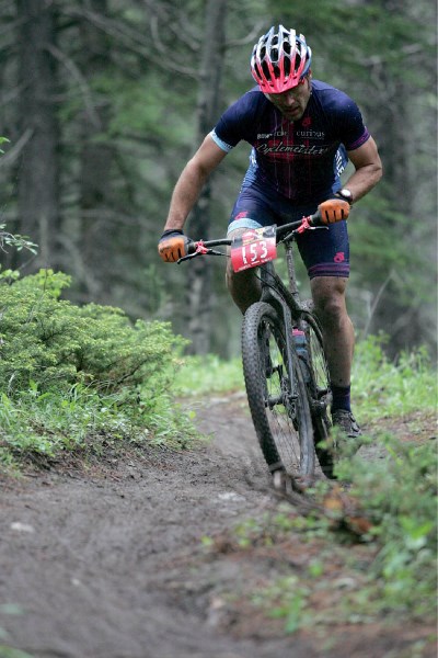 Gabor Csonka pilots his gearless, suspensionless bike to victory in the Rundle’s Revenge 100 km mountain bike race at the Canmore Nordic Centre Saturday (June 23).