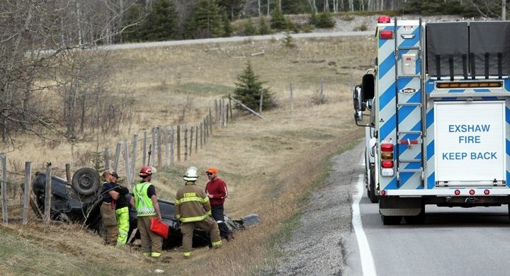 Exshaw Fire Rescue members respond to a vehicle collision on Highway 1A, between Exshaw and Morley in 2015. RMO FILE PHOTO