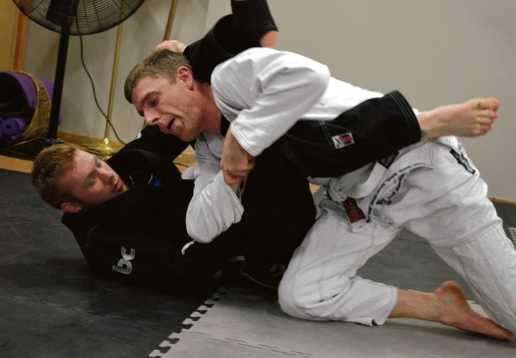 Jiu-jitsu club postures for championship - Bow Valley News