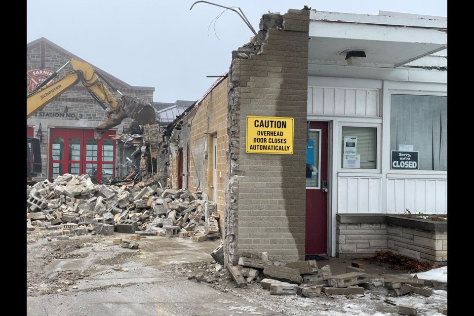 Demolition underway of the old Sarnia Fire Station #3 at the corner of Colborne and Michigan Avenue.