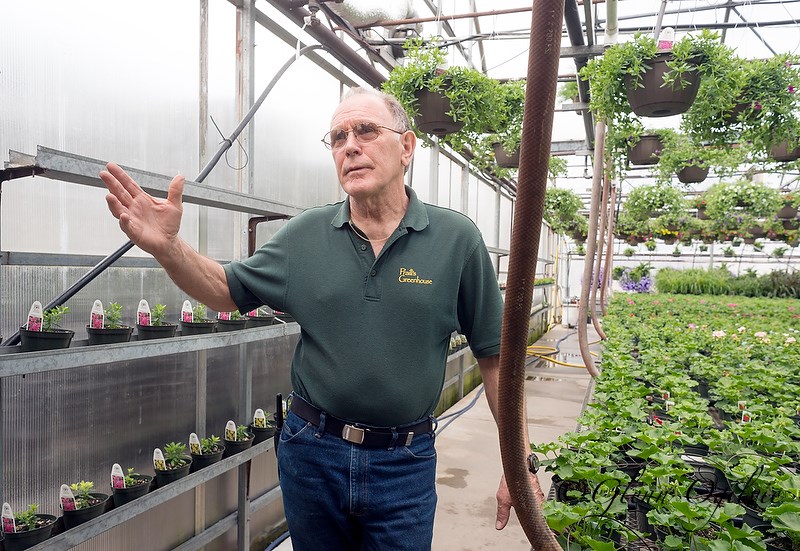 Bruce Praill explains the 100-year-old family business to some visitors. Glenn Ogilvie