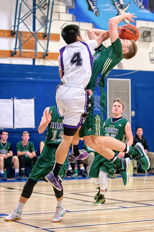 2016-12-20-annual-rebound-charity-double-header-game-2-st-pats-vs-glss-st-pats-won-43-42-2016-325807-nyugen-vs-grant-dugas-v1-copy_1