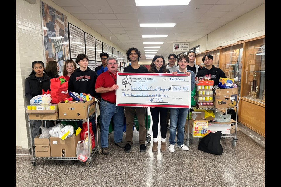 Students from Northern Collegiate joined Myles Vanni from the Inn of the Good Shepherd to celebrate their successful food drive.