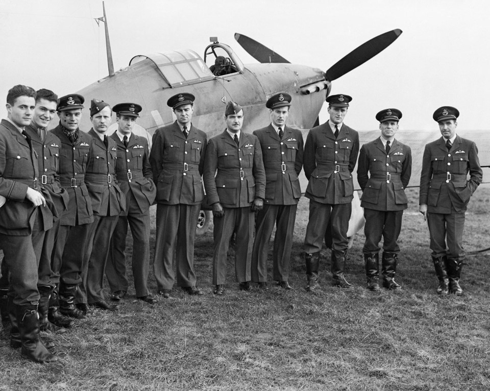 RCAF No. 1 Fighter Squadron. Squadron Leader Ernie McNab is the shortest airman in center of pic