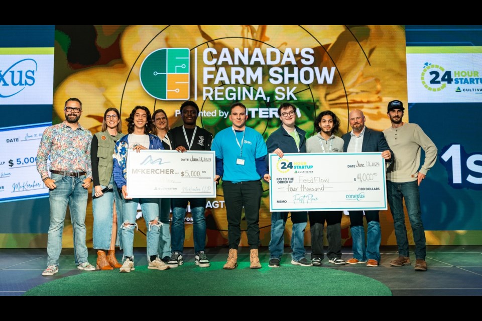 Conexus Credit Union and McKercher LLP present cheques to FeedFlow, first place winners of 24 Hour Startup | AGTECH. 