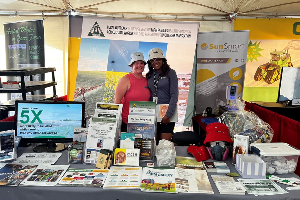 Kendra Ulmer (left), manager of the Agricultural Health and Safety Network in the Canadian Centre for Rural and Agricultural Health at the University of Saskatchewan, with Marion Waysome-McIntyre (right), population health promotion practitioner with the Saskatchewan Cancer Agency, Sun Smart Saskatchewan. Ag in Motion, 2024. 