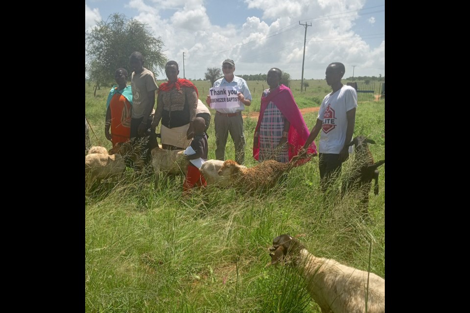 For over a decade, Vic Hamer of Elkhart, Illinois has been bringing fresh water and other life-changing resource to the needy in Kenya. Hamer, who can be found at Burgis Beach during the summer, started doing volunteer work in Kenya in 2010. In 2012, he joined “Give Me Water Lord,” a not for profit organization based in Elkhart. In the photo, Hamer is at a Baptist Church near Email, Kenya, donating goats to people who had lost their goats to the recent droughts. This will provide the families a chance to regain some hope back into their lives. The next GMWL Water Well Project, in memory of Vic Hamer’s parents, Carlynn and Frederick Hamer, will be completed in January, 2025. Anyone  who wishes to make a donation  may do so by sending a check to the Ebenezer Baptist Church. Please indicate which GMWL project you are supporting.
