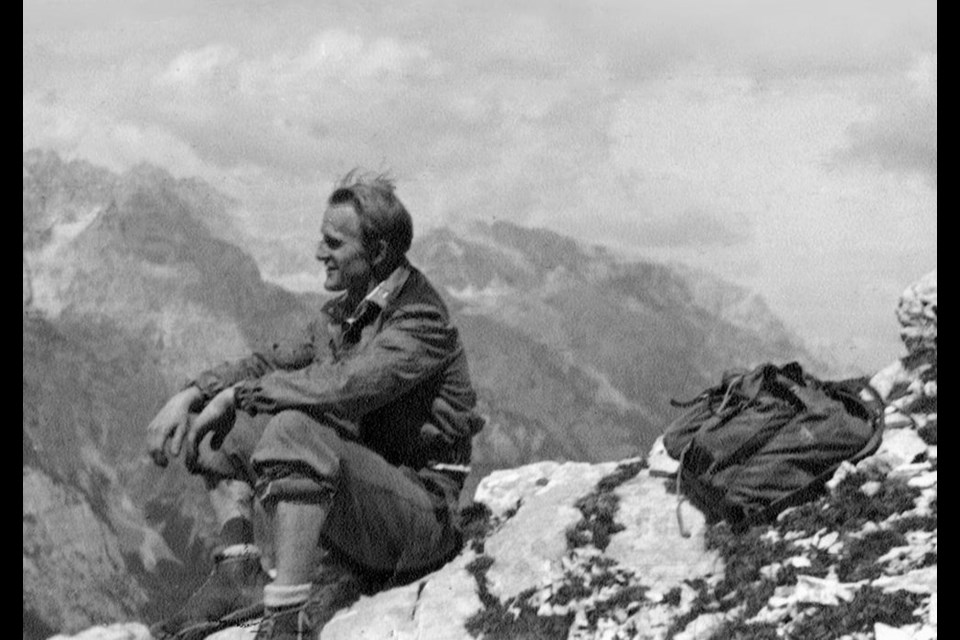 John Stermscheg sits on the top of a mountain in the Austrian Alps in 1946 following the Second World War, in which he served with the Yugoslav army. 