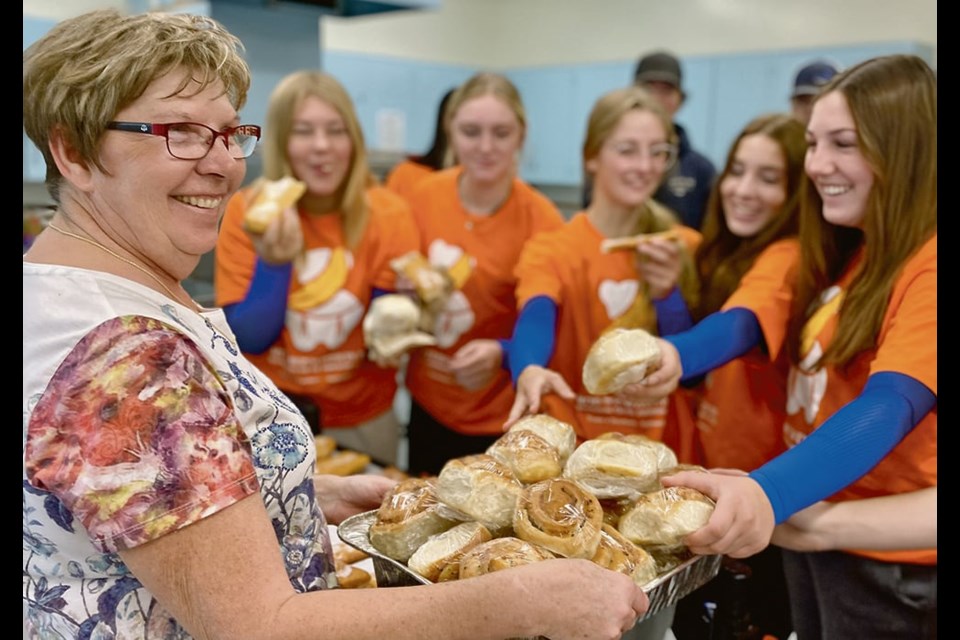 Charlotte Shewchuk’s homemade cinnamon buns and long johns fly out of the kitchen at Montmartre School. 