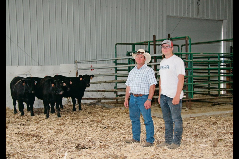 Dave and Carlin Rajotte of D & N Livestock at Peebles, Sask., are participating in an ADOPT project that is testing ear tag technology to determine if heifers are in heat. | 