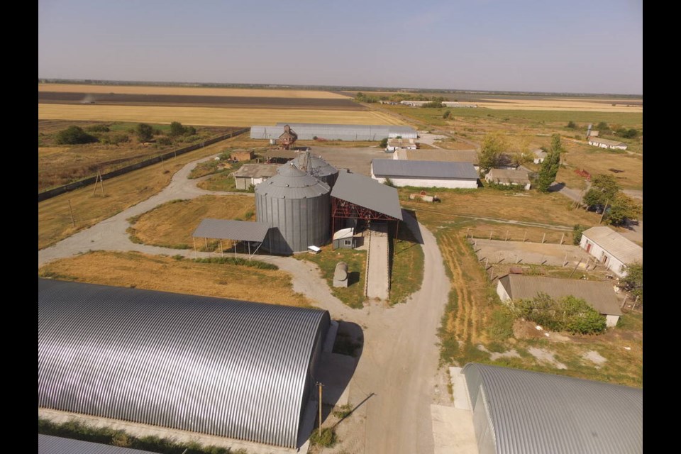 Mykola manages a large agricultural firm in the north of Ukraine. It farms 100,000 acres of land. Every year it produces grain in excess of 300,000 tonnes and earn tens of millions of dollars.