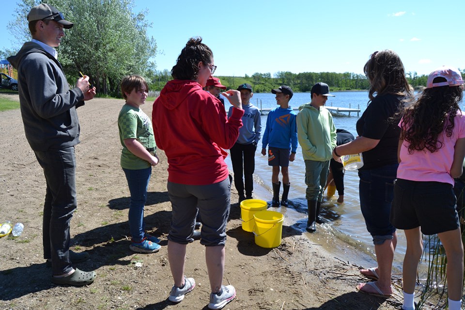 As part of the Fish in Schools Program, the CCS Grade 5 class made the trip to Lady Lake on June 17 to release the rainbow trout after taking care of them since early February. 