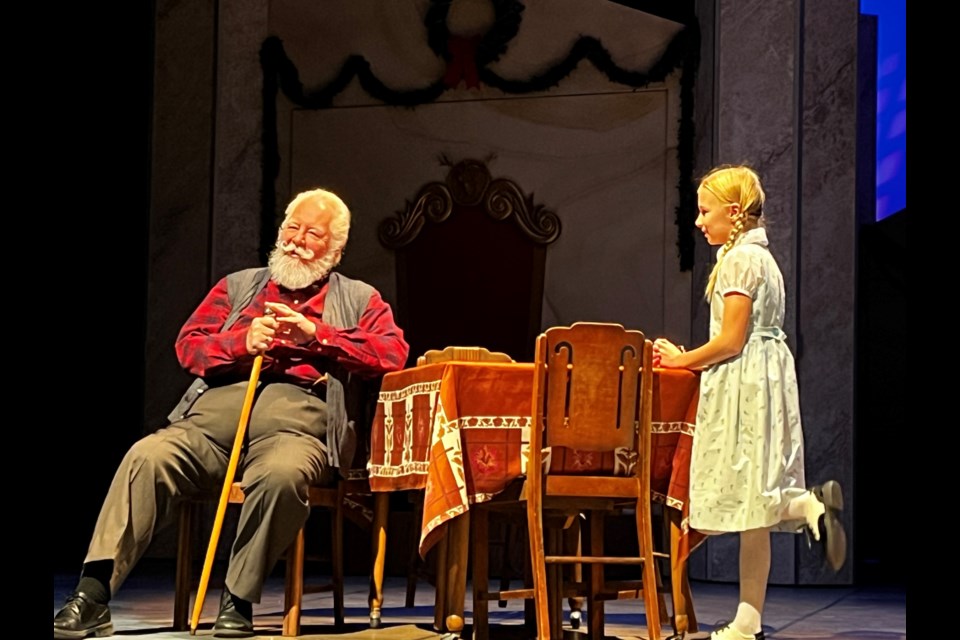 Actors playing Kris Kringle and Susan, in Persephone Theatre's production of 'Miracle on 34th Street', now running Dec. 4-29.