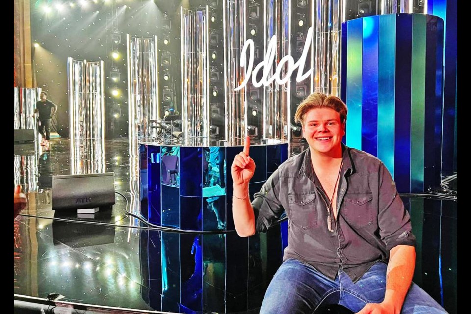 Singer Brayden King sat on the edge of the stage for the nationally-broadcast American Idol, where he has found success, advancing from the Hollywood Week set of two nights.