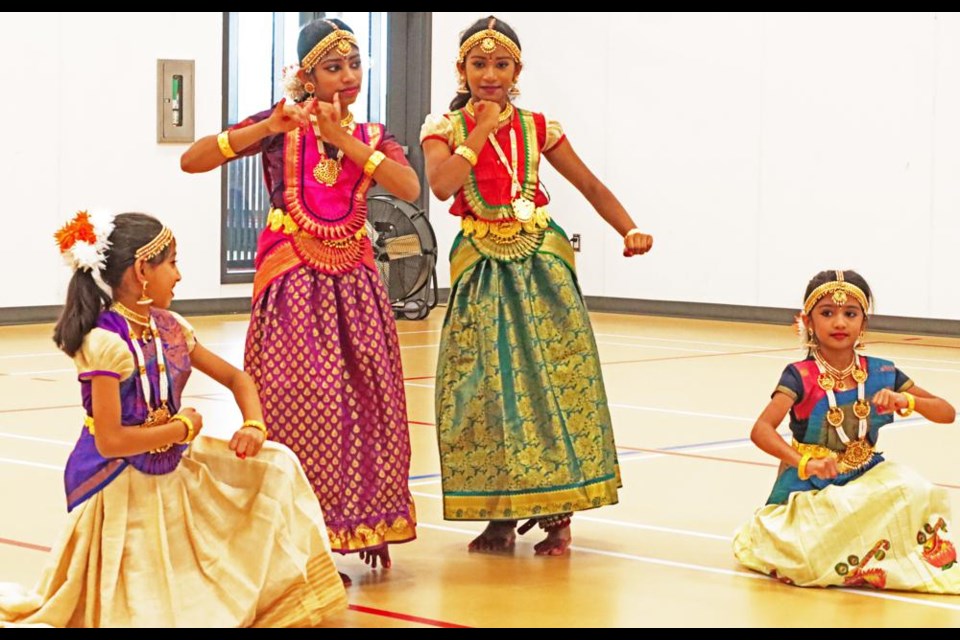 Dancers Meswa Patel, Helen Joe, Karen Joe and Catherine Manjaly posed at the end of a traditional dance from India, from the province of Kerala, performed as part of Weyburn's Culture Days on Saturday.