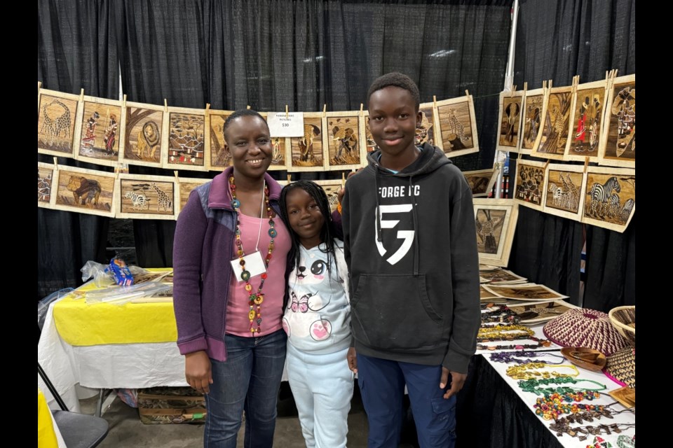 From left, Judy, Nelly and Nathan Wera travelled from Swift Current to be part of the Homespun experience with their Authentic African Crafts. 

