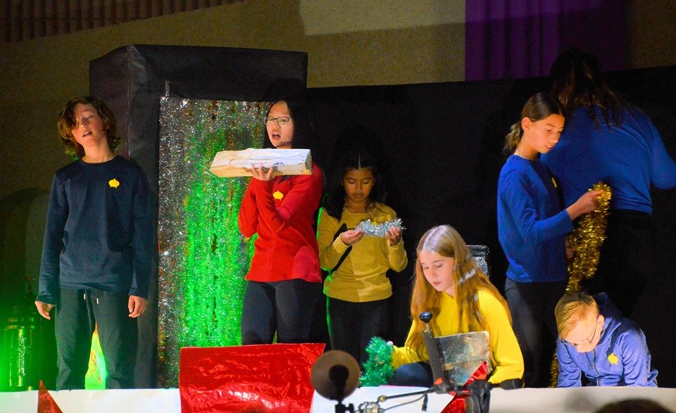 The captain of the S.S. Emmanuel records an update in her captain’s log at the St. Peter’s School Christmas concert, Dec. 12. Grade 6 students on stage are Owen N., Ela A., Danica V., Sophie R., Layne J., Colton B. and Aliyah T.