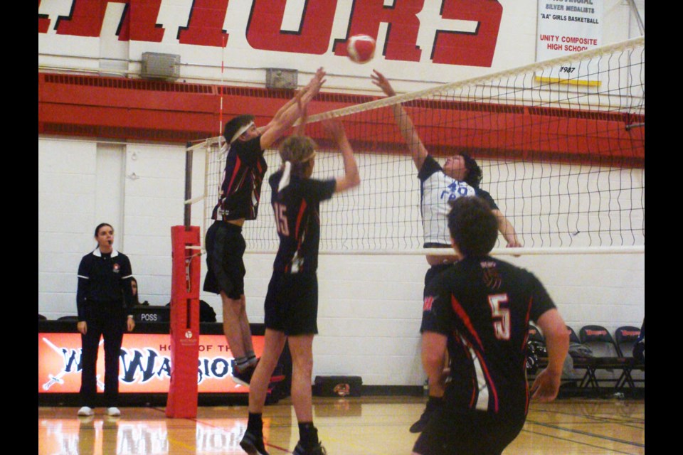 The senior boys were soaring on the court against the Makwa Falcons during conferences on Nov. 9. Dawson Gilbert and Dylan Kelly work together as they block the ball. 