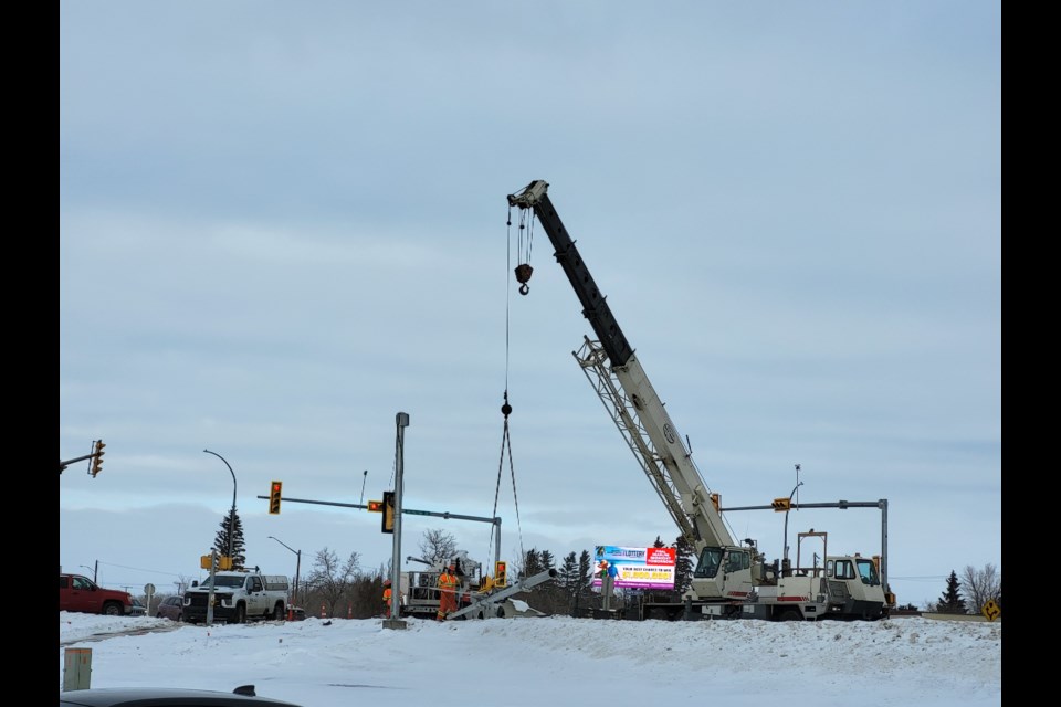 Wind topples lights on southbound Territorial Drive. Crews are working to restore them.