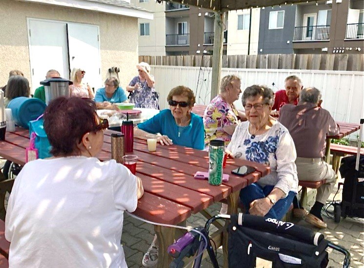 Trinity Tower residents get to enjoy barbecues on their patio throughout the summer. 