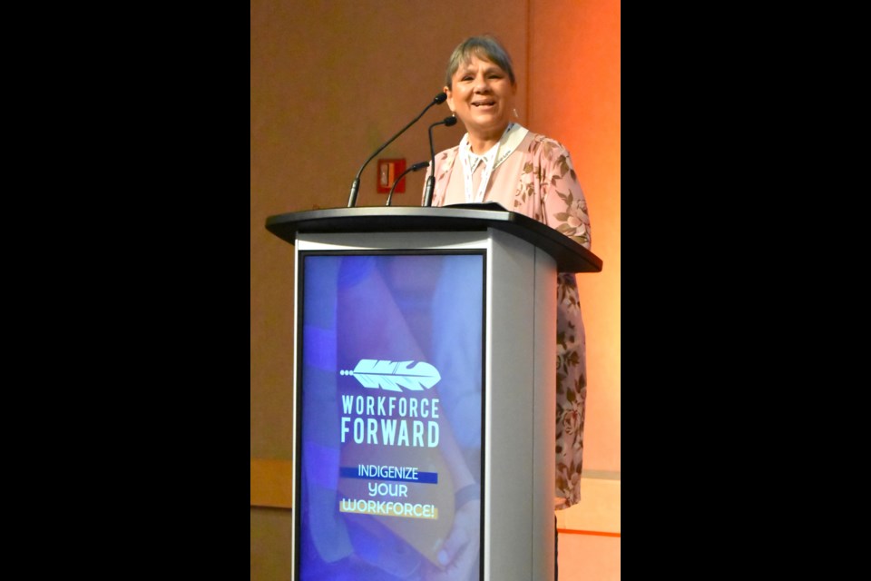 Carolyn Crowe delivers her opening remarks during the Indigenous Workforce Summit on Tuesday at TCU Place.